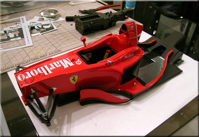 Front suspension arms are CFed and attached with epoxy glue
